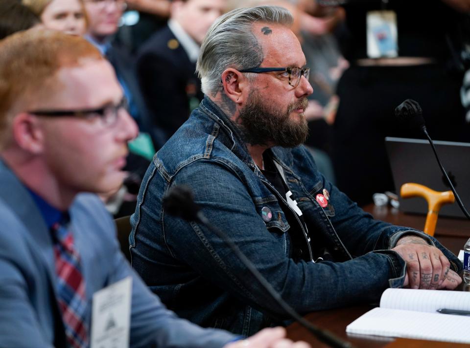 U.S. Capitol rioter Stephen Ayres, left, and former Oath Keepers spokesman Jason Van Tatenhove wait to testify on July 12, 2022, before the House Jan. 6 committee.
