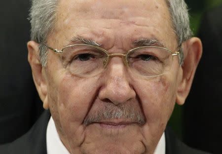 Cuba's president Raul Castro attends a family photo during a CARICOM summit in Havana December 8, 2014. REUTERS/Enrique De La Osa