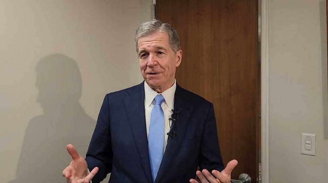 N.C. Gov. Roy Cooper talks to reporters after a Council of State meeting on Tuesday, Aug. 6, 2024 at the Department of Transportation building in downtown Raleigh.