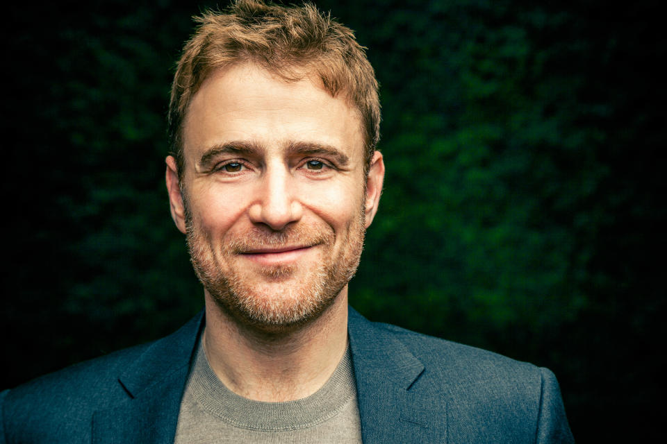 Stewart Butterfield with some greenery in the background