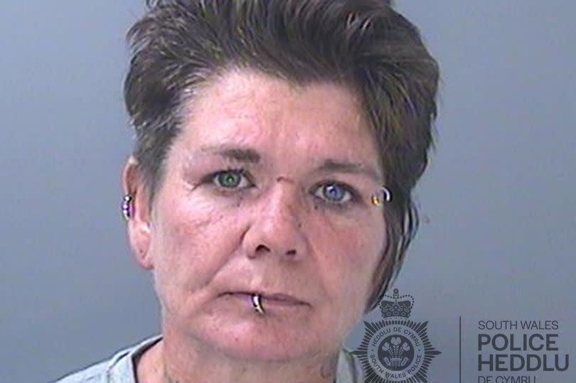 Helen Lawrence, 46, bit and punched a committee member of a Tonypandy Workingmen's Club after she was thrown out