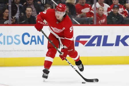 Apr 2, 2019; Detroit, MI, USA; Detroit Red Wings left wing Tyler Bertuzzi (59) takes a shot during the second period against the Pittsburgh Penguins at Little Caesars Arena. Mandatory Credit: Raj Mehta-USA TODAY Sports