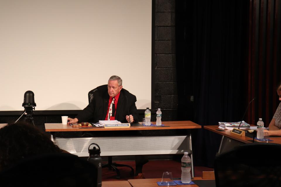 Brockton School Committee member Timothy Sullivan, of Ward 7, leads the committee meeting on August 15, 2023 at Brockton High School's Little Theater.