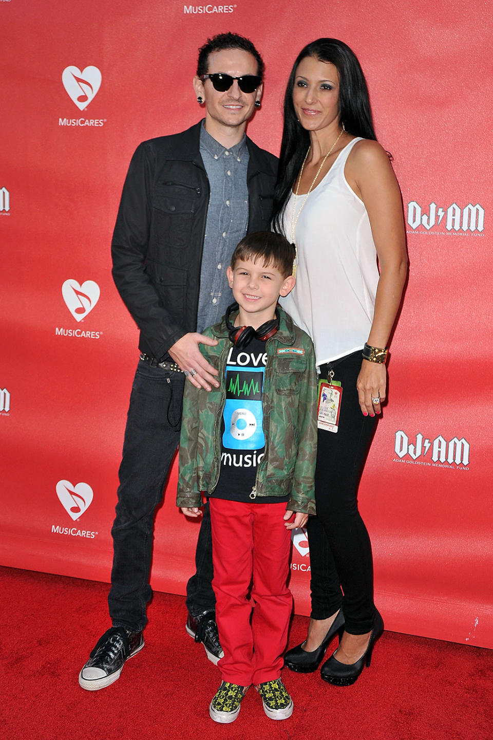 <p>Chester Bennington, wife Talinda Bennington and son Tyler Lee Bennington arrive at the 9th Annual MusiCares MAP Fund Benefit Concert at Club Nokia on May 30, 2013 in Los Angeles, California. (Photo: Jerod Harris/WireImage) </p>