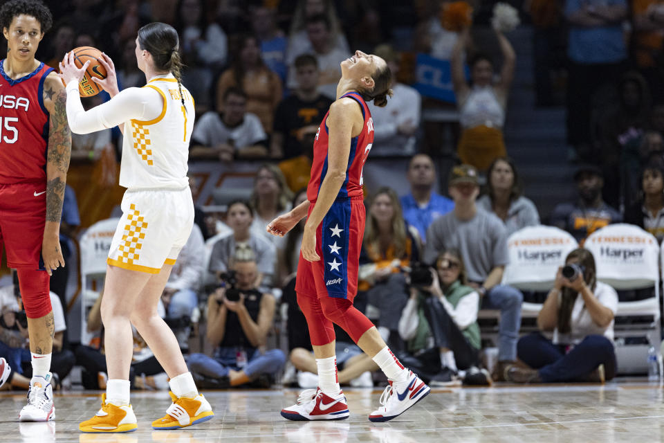 Team USA guard Diana Taurasi, fronrt right, reacts after being called for a foul during the second half of an NCAA college basketball exhibition game against Tennessee, Sunday, Nov. 5, 2023, in Knoxville, Tenn. (AP Photo/Wade Payne)