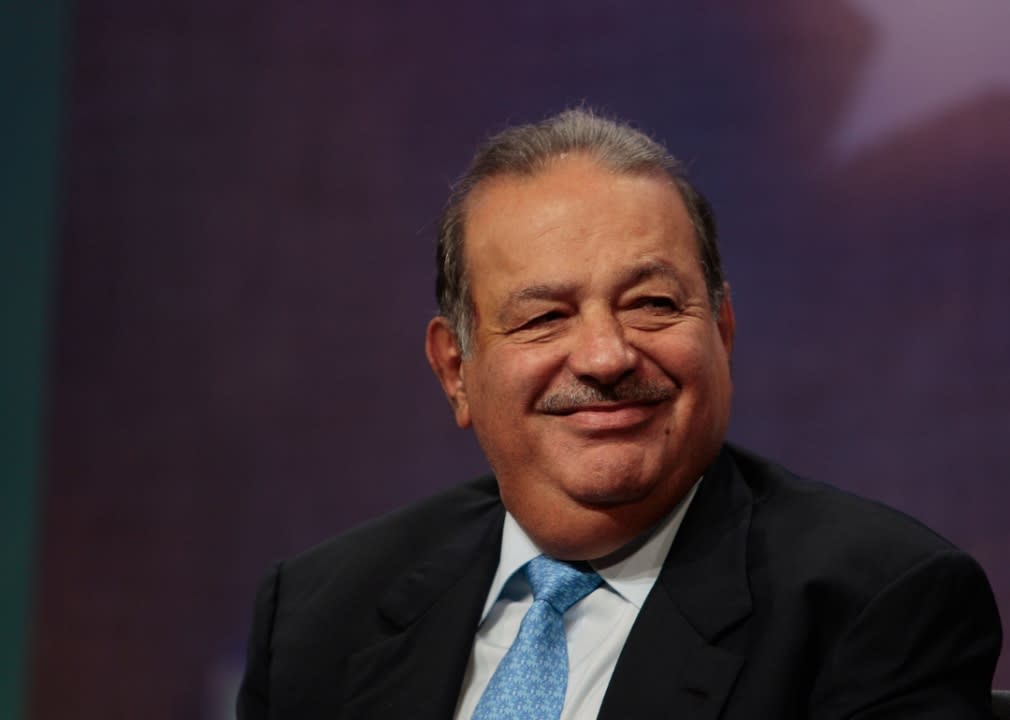 14. Carlos Slim Helu & family | Net worth: $64.5 billion - Source of wealth: telecom - Age: 81 - Country/territory: Mexico | Mexican business magnate Carlos Slim Helú has extensive holdings in energy, mining, communications, retail, and finance through his Grupo Carso conglomerate. For many years, he owned the country’s former telephone monopoly, Telmex. He founded the art museum Museo Soumaya in Mexico City, helped revitalize the historic city center, and set up the Carlos Slim Foundation to promote education, health, and sports. (Chris Hondros/Getty Images)