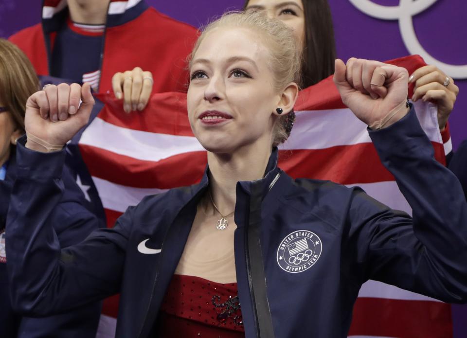 Bradie Tennell reacts to scores after her debut performance at the 2018 Winter Olympics. (AP)