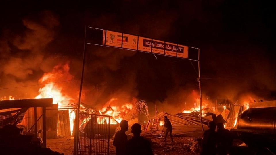 PHOTO: Fire rages following an Israeli strike on an area designated for displaced Palestinians, amid the ongoing conflict between Israel and Hamas, in Rafah in the southern Gaza Strip, May 26, 2024.  (Reuters)