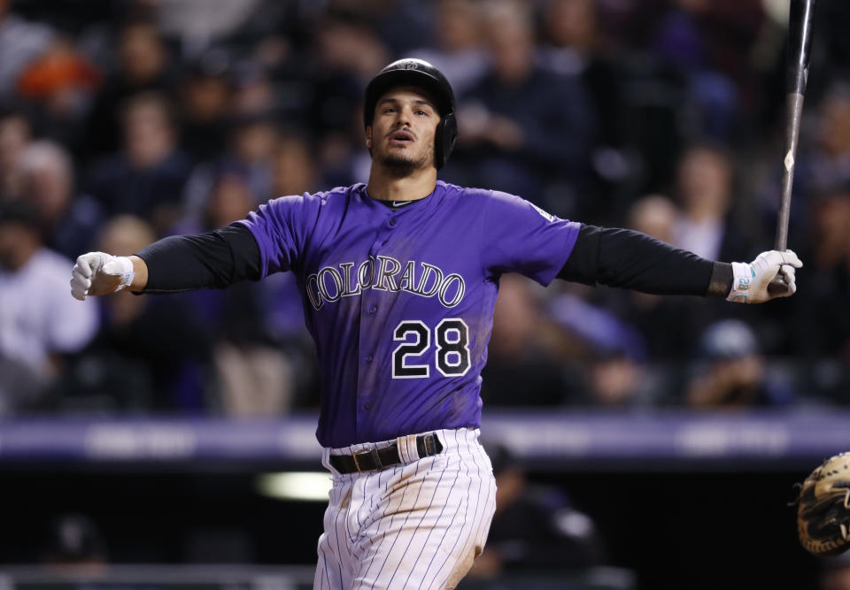 Colorado Rockies' Nolan Arenado swings and misses at a pitch from San Diego Padres relief pitcher Jose Torres in the sixth inning of a baseball game Monday, April 10, 2017, in Denver. Arenado struck out on the next pitch. The Padres won 5-3. (AP Photo/David Zalubowski)