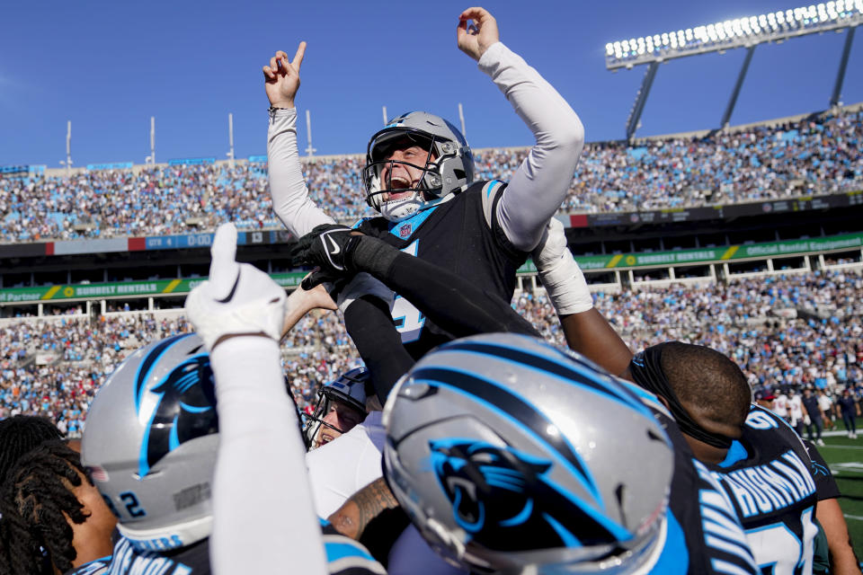 Carolina Panthers' Eddy Pineiro (4) celebrates after kicking the game-winning field goal after an an NFL football game against the Houston Texans, Sunday, Oct. 29, 2023, in Charlotte, N.C. The Carolina Panthers won 15-13. (AP Photo/Erik Verduzco)