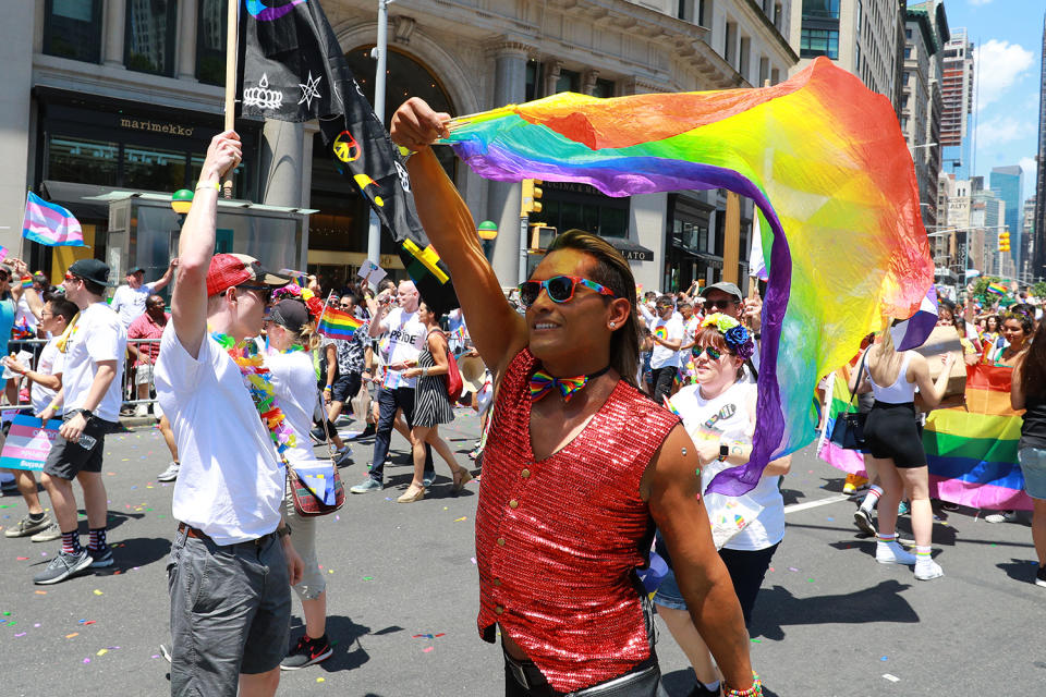 People wave rainbow flags during the NYC Pride Parade in New York, Sunday, June 30, 2019. (Gordon Donovan/Yahoo News)