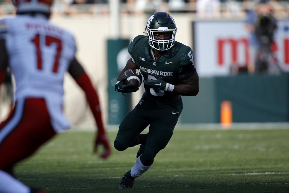 Michigan State running back Nathan Carter (5) rushes against Maryland during the first half of an NCAA college football game, Saturday, Sept. 23, 2023, in East Lansing, Mich. (AP Photo/Al Goldis)