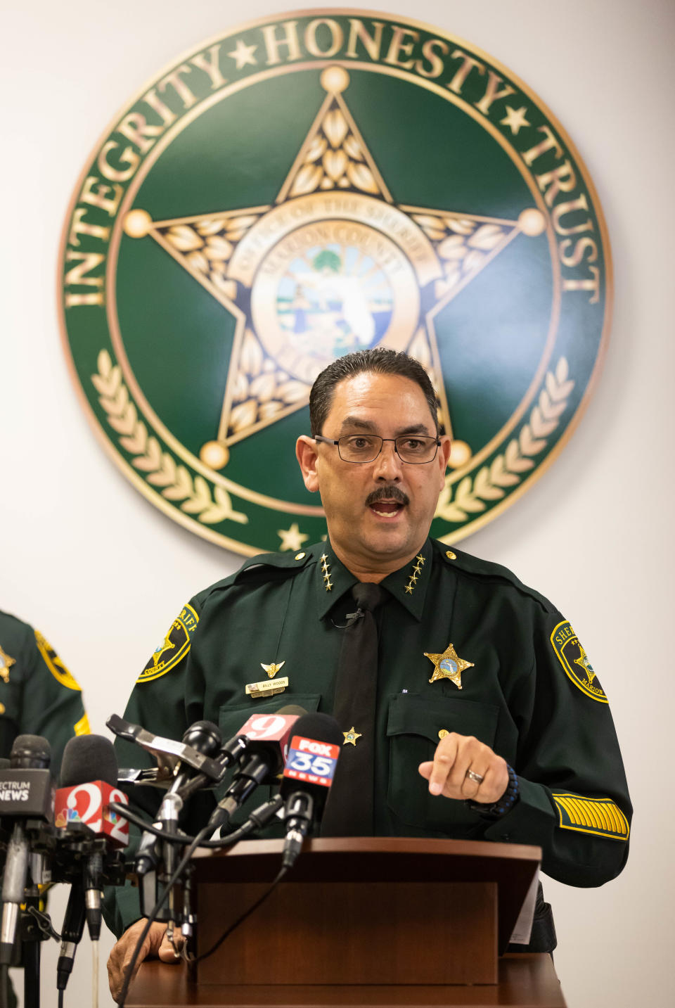 Marion County Sheriff Billy Woods announced on April 7, 2023, that they had made an arrest in the "hybrid gang" triple murders in the Ocklawaha area of Marion County, Florida.
