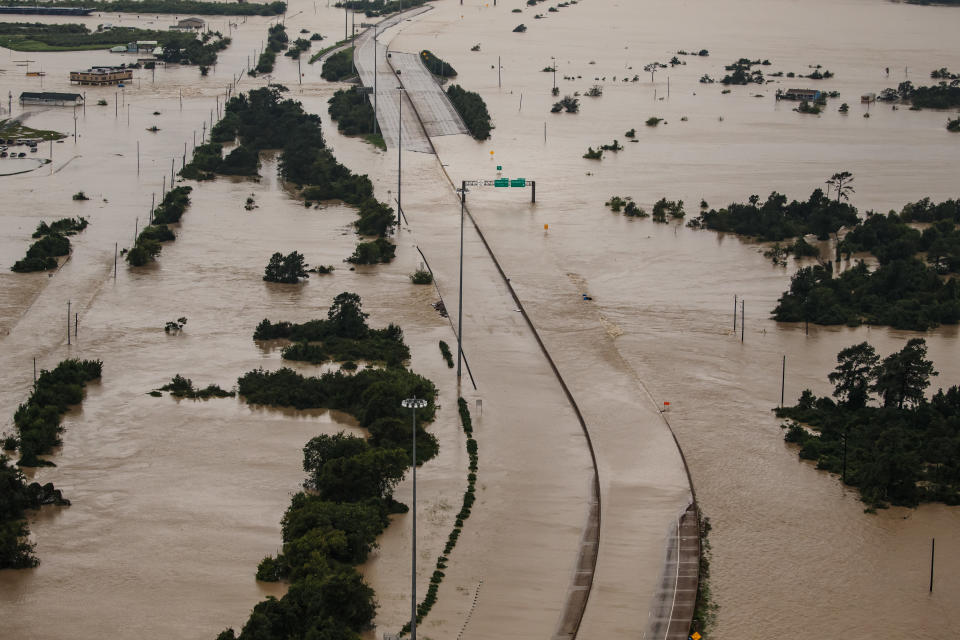 <p>Portions of the Interstate 10 remains flooded in the wake of Hurricane Harvey after it dumped up to 50 inches of rain in Houston, Texas, on Aug. 29, 2017. (Photo: Marcus Yam / Los Angeles Times via Getty Images) </p>