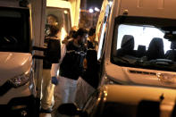 Turkish police officers gather as they prepare to enter the Saudi Arabia's Consulate in Istanbul, Monday, Oct. 15, 2018. Turkish crime scene investigators dressed in coveralls and gloves entered the consulate Monday, nearly two weeks after the disappearance and alleged slaying of Saudi writer Jamal Khashoggi there. (AP Photo/Petros Giannakouris)