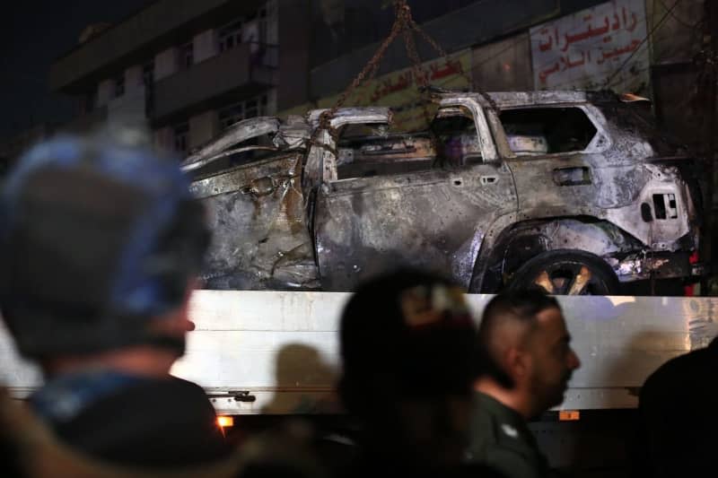 A vehicle that was hit by a drone strike, reportedly killing three people including two leaders of a pro-Iran group, is carried away in Baghdad. A media outlet close to the Iran-backed militia, reported that Abu Baqir al-Saadi, a leader in the Hashd Shaabi group, was killed along with his aide. Ameer Al-Mohammedawi/dpa