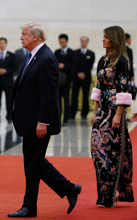 Melania's Gucci cheongsam - Credit: Reuters