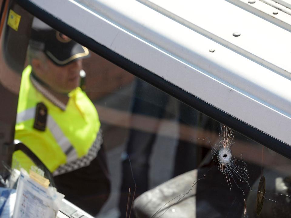 Bullet holes are seen on the windscreen of a stolen butane gas delivery lorry in Barcelona on 21 February (AFP/Getty Images)