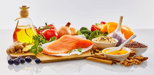 <span class="caption">Half the participants were asked to eat more vegetables, legumes, fruits, nuts, olive oil, and fish -- and less red meat and dairy.</span> <span class="attribution"><a class="link " href="https://www.shutterstock.com/image-photo/panoramic-banner-fresh-healthy-food-heart-622969142" rel="nofollow noopener" target="_blank" data-ylk="slk:stockcreations/ Shutterstock;elm:context_link;itc:0;sec:content-canvas">stockcreations/ Shutterstock</a></span>