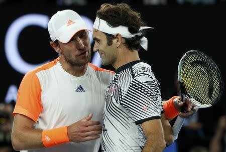 Tennis - Australian Open - Melbourne Park, Melbourne, Australia - 24/1/17 Switzerland's Roger Federer shakes hands after winning his Men's singles quarter-final match against Germany's Mischa Zverev. REUTERS/Edgar Su