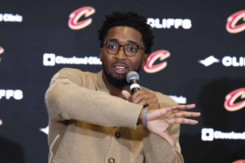 Cleveland Cavaliers guard Donovan Mitchell answers a question during an NBA basketball news conference, Wednesday, Sept. 14, 2022, in Cleveland. (AP Photo/Ron Schwane)