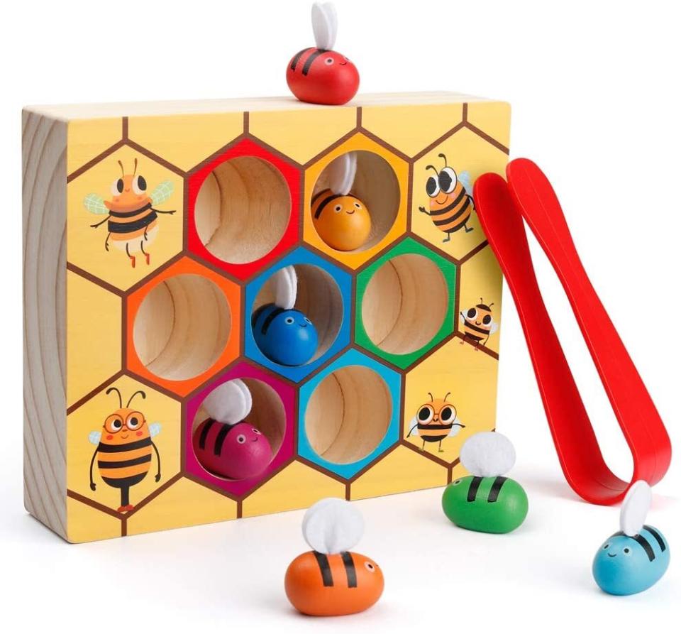 It's buzzing with ways to develop hand-to-eye coordination and sorting/counting skills and made from eco-friendly wood that won't sting the wallet.<br /><br /><strong>Promising Review:</strong> "My 17-month-old loves this game, and it develops his fine motor skills at the same time. We talk about colors and the bee and what noise it makes, how it flies with wings, etc. The wings stay on well and it is well-crafted all around. If your child prefers to use their fingers instead of the tweezers, the holes for bees are big enough actually for an adult to do so also. What a fun and educational activity!" &mdash; <a href="https://www.amazon.com/gp/customer-reviews/R1ODCEROTCD8VB?&amp;linkCode=ll2&amp;tag=huffpost-bfsyndication-20&amp;linkId=f7f0144497eb682e4f897f1c89a8e415&amp;language=en_US&amp;ref_=as_li_ss_tl" target="_blank" rel="noopener noreferrer">SAHM Teacher</a><br /><br /><i>For ages 12+ months<br /><br /></i><strong><a href="https://www.amazon.com/Coogam-Matching-Montessori-Preschool-Educational/dp/B07RZNG5PW?&amp;linkCode=ll1&amp;tag=huffpost-bfsyndication-20&amp;linkId=dc7a1c0c82e06fe098af97e84811c43e&amp;language=en_US&amp;ref_=as_li_ss_tl" target="_blank" rel="noopener noreferrer">Get it from Amazon for $15.99.</a></strong>