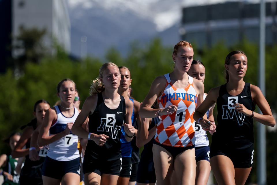 Timpview’s Jane Hedengren runs in the pack on her way to first place in the 5A girls 3,200meter finals at the Utah high school track and field championships at BYU in Provo on Thursday, May 18, 2023. | Spenser Heaps, Deseret News