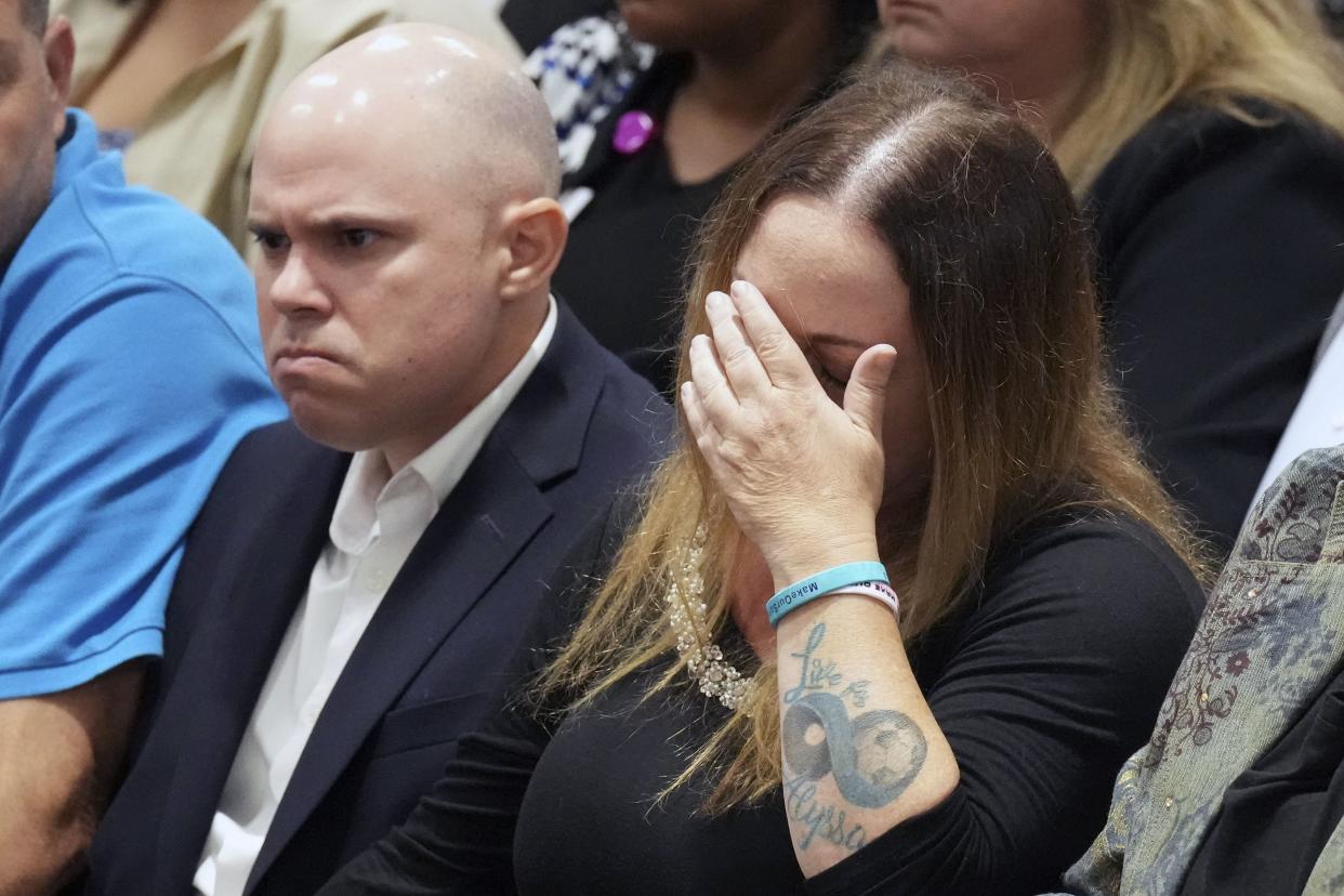 Ilan and Lori Alhadeff, center, react as they hear that their daughter's murderer will not receive the death penalty as the verdicts are announced in the trial of Marjory Stoneman Douglas High School shooter Nikolas Cruz at the Broward County Courthouse in Fort Lauderdale, Fla. on Thursday, Oct. 13, 2022.