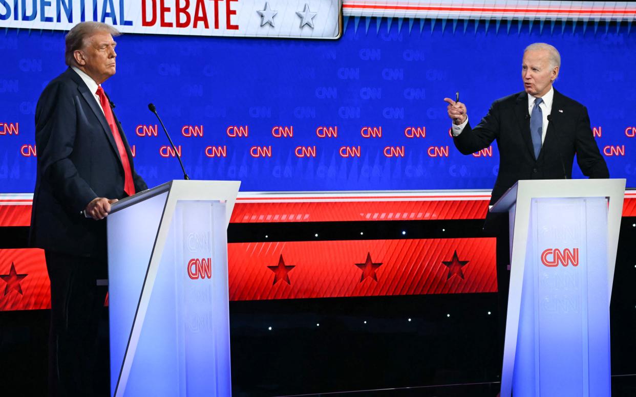 President Joe Biden and former President Donald Trump face off in the first 2024 presidential debate in Atlanta on June 27. (Credit: AFP)