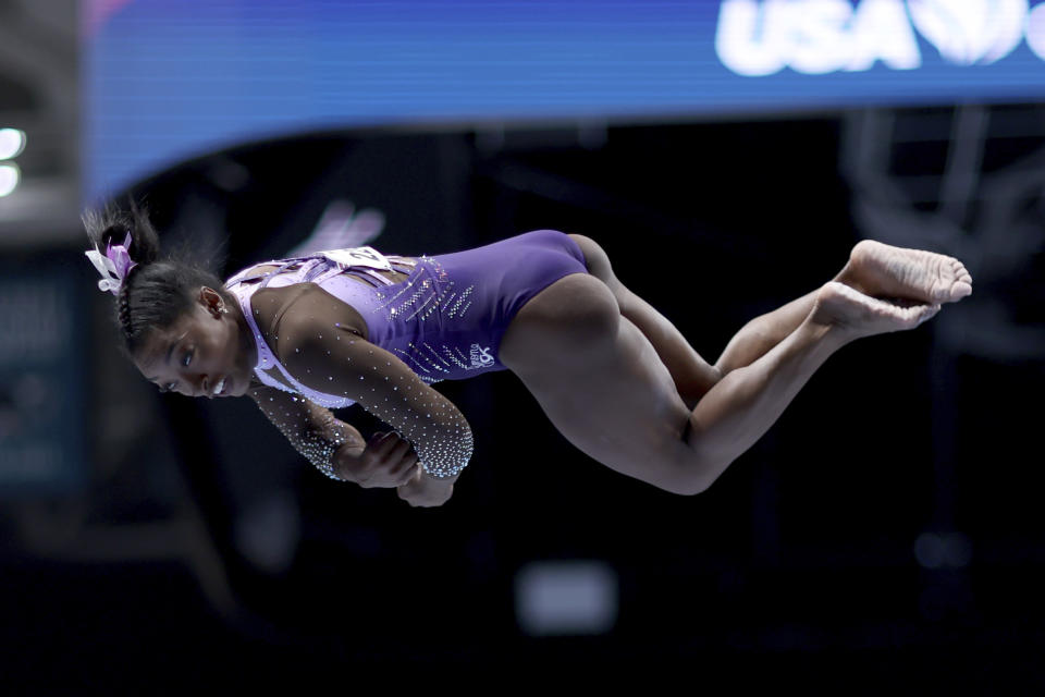 Simone Biles competes on the balance beam at the U.S. Gymnastics Championships, Friday, Aug. 25, 2023, in San Jose, Calif. (AP Photo/Jed Jacobsohn)