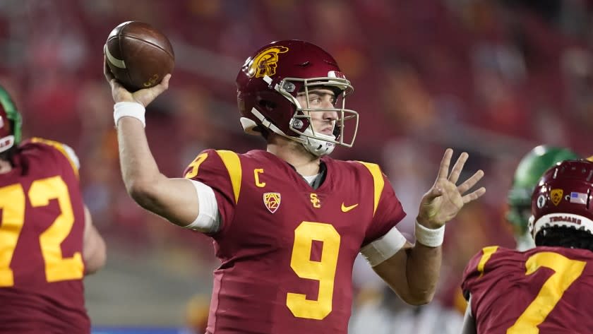 Southern California quarterback Kedon Slovis (9) throws a pass during the first half of an NCAA college football game for the Pac-12 Conference championship against Oregon Friday, Dec 18, 2020, in Los Angeles. (AP Photo/Ashley Landis)