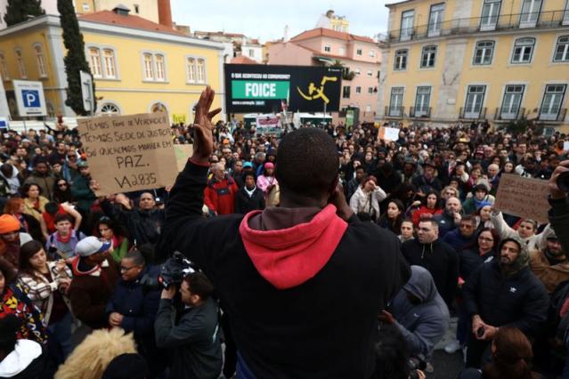 A person addresses the protesters, during a demonstration against the cost of living in Lisbon