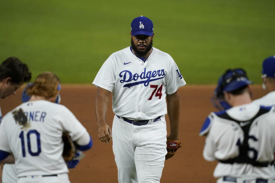 Los Angeles Dodgers relief pitcher Kenley Jansen (74) walks up to the mound to work against the San Diego Padres in Game 1 of a baseball National League Division Series Wednesday, Oct. 7, 2020, in Arlington, Texas. (AP Photo/Tony Gutierrez)