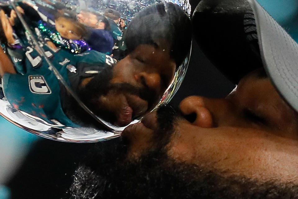 <p>Brandon Graham #55 of the Philadelphia Eagles celebrates with the Vince Lombardi Trophy after his teams 41-33 win over the New England Patriots in Super Bowl LII at U.S. Bank Stadium on February 4, 2018 in Minneapolis, Minnesota. The Philadelphia Eagles defeated the New England Patriots 41-33. (Photo by Kevin C. Cox/Getty Images) </p>