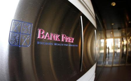 The logo of Swiss Bank Frey is pictured at the entrance of an office building at the Bahnhofstrasse street in Zurich April 18, 2013. REUTERS/Arnd Wiegmann