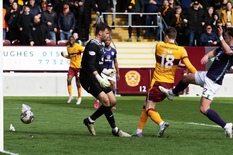 Oli Shaw sent a shot inches past the right post that would have given Motherwell a dramatic win