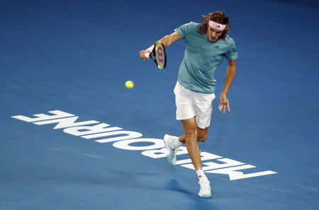 Tennis - Australian Open - Fourth Round - Melbourne Park, Melbourne, Australia, January 20, 2019. Greece’s Stefanos Tsitsipas in action during the match against Switzerland’s Roger Federer. REUTERS/Edgar Su