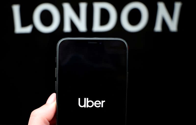 FILE PHOTO: The Uber logo is displayed on a mobile phone in this picture illustration