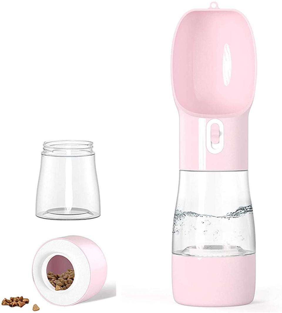 Husdown Dog Water Bottle in pink with water and dog treats on white background