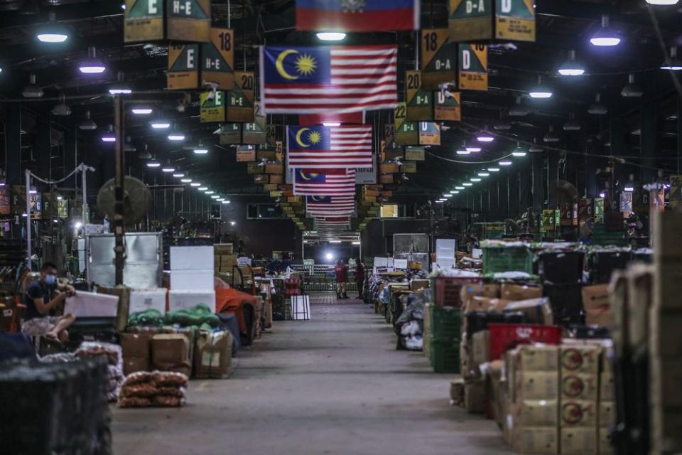 Lau said businesses are passed on within the migrant community due to a lack of local interest in jobs at the wet market. — Picture by Hari Anggara