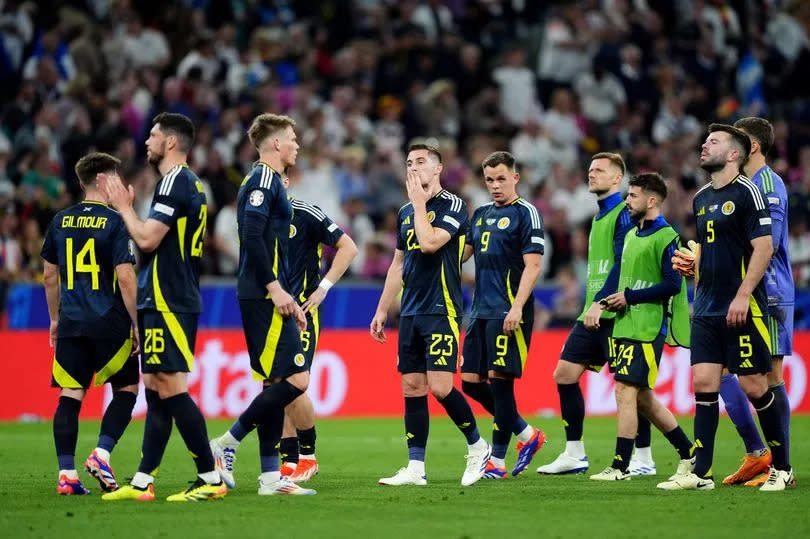 Scotland players appear dejected after defeat to Germany