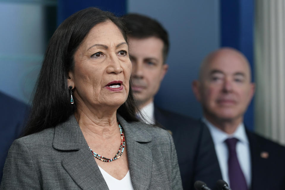 FILE - Interior Secretary Deb Haaland, left, speaks during a briefing at the White House in Washington, Monday, May 16, 2022. A pair of dams on the Pine Ridge Indian Reservation in South Dakota will get safety repairs with part of $29 million in funding from the federal infrastructure deal, the Department of the Interior announced Wednesday, May 18.(AP Photo/Susan Walsh, File)