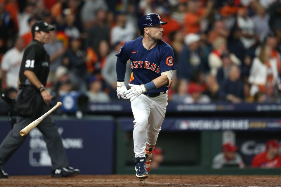 Houston Astros third baseman Alex Bregman tosses his bat after hitting a two-run homer against the Philadelphia Phillies during Game 2 of the World Series.