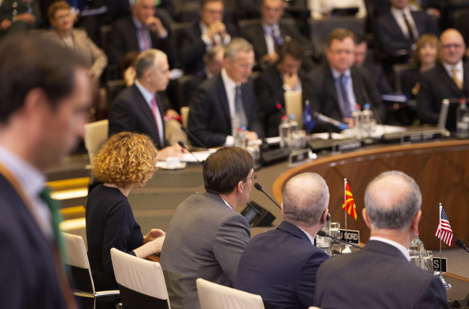 U.S. Secretary for Defense Mark Esper, third right, listens to the opening address as he attends a meeting of the North Atlantic Council at NATO headquarters in Brussels, Thursday, Feb. 13, 2020. NATO ministers, in a second day of meetings, will discuss building stability in the Middle East, the Alliance's support for Afghanistan and challenges posed by Russia's missile systems. (AP Photo/Virginia Mayo)