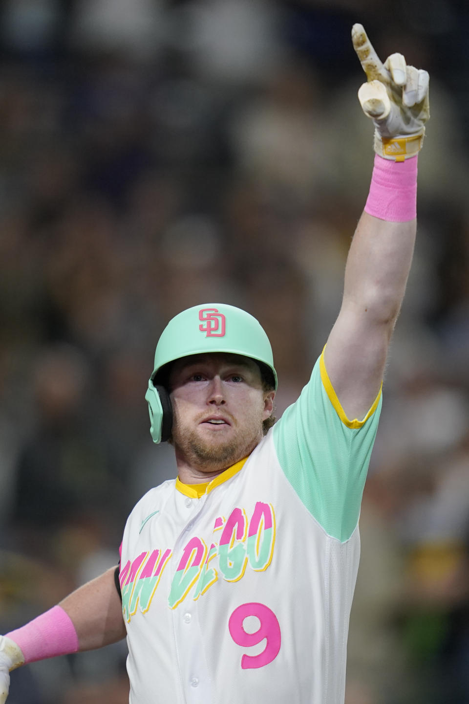 San Diego Padres' Jake Cronenworth celebrates his two-run home run during the sixth inning of a baseball game against the Chicago White Sox, Saturday, Oct. 1, 2022, in San Diego. (AP Photo/Gregory Bull)