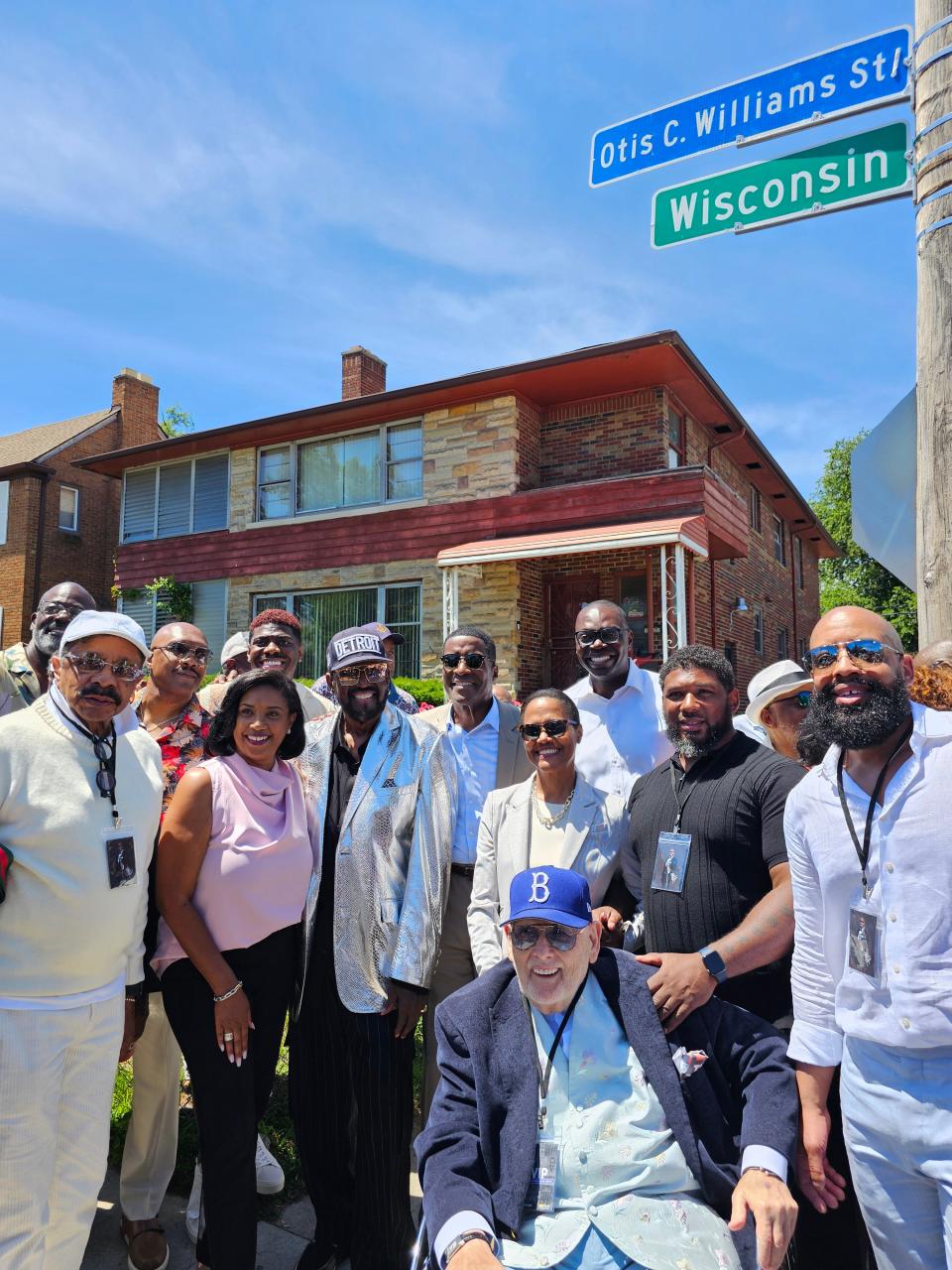 The Temptations' Otis Williams (center, in Detroit cap), is joined by the Motown Museum's Robin Terry, Detroit City Council member Angela Calloway, Michigan Lt. Gov. Garlin Gilchrist and others as Otis C. Williams Street is unveiled on Saturday, June 15, 2024.