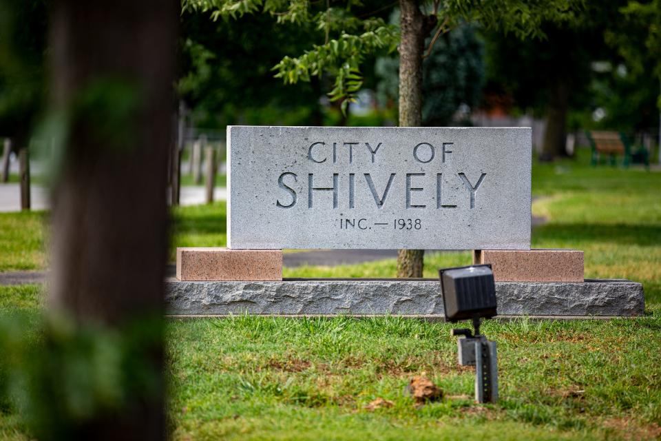 A City of Shively sign is seen in front of the Shively branch of the Louisville Free Public Library.