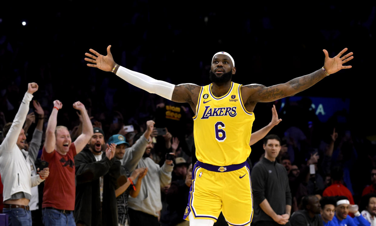 LeBron James celebrates after setting the NBA's all-time regular season scoring record during a game against the Oklahoma City Thunder at the Crypto.com Arena in Los Angeles on Feb. 7, 2023. (Keith Birmingham/MediaNews Group/Pasadena Star-News via Getty Images)