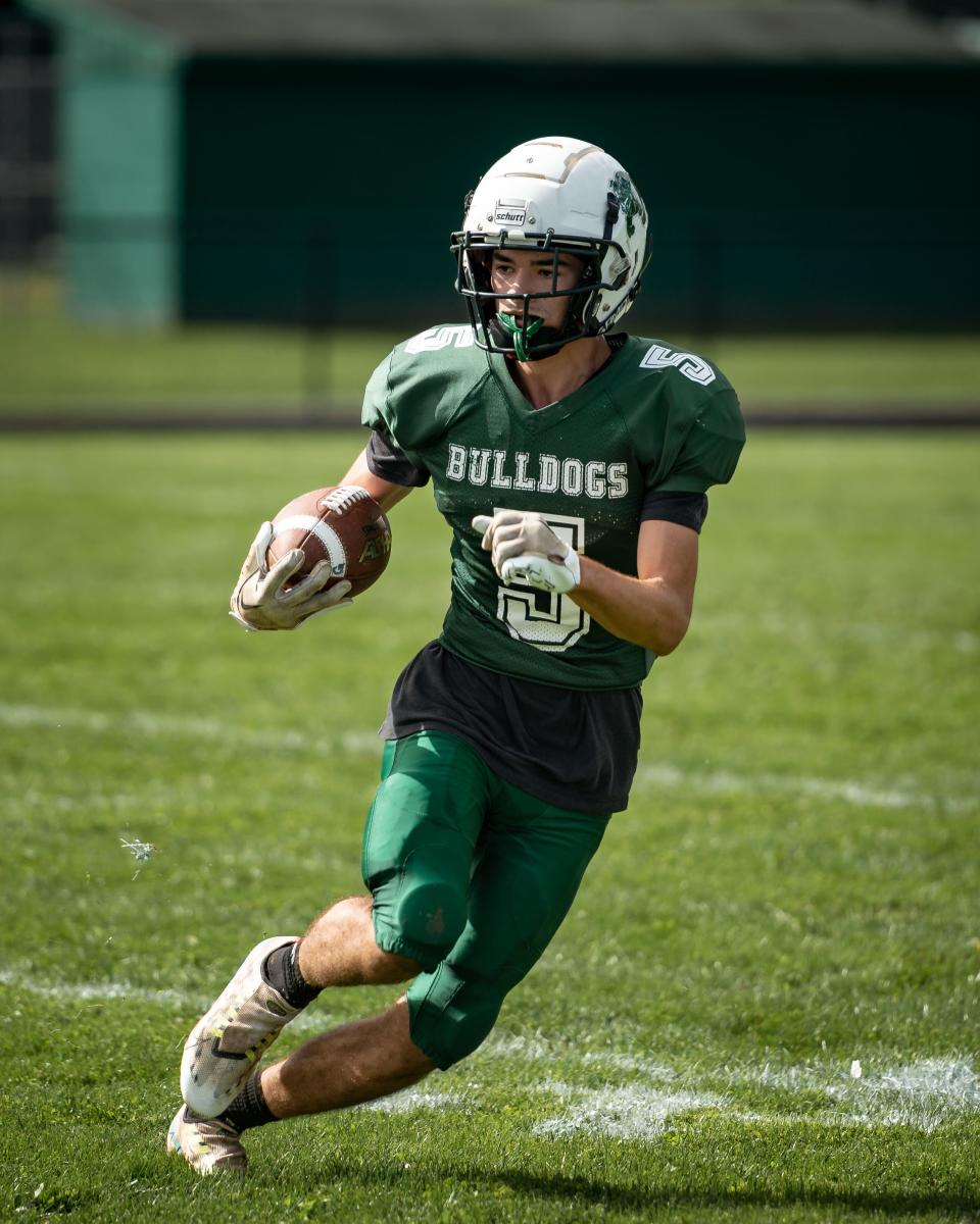 Cameron Rautenstrauch runs the ball for Westmoreland/Oriskany during an Oct. 1, 2022, game against General Brown.