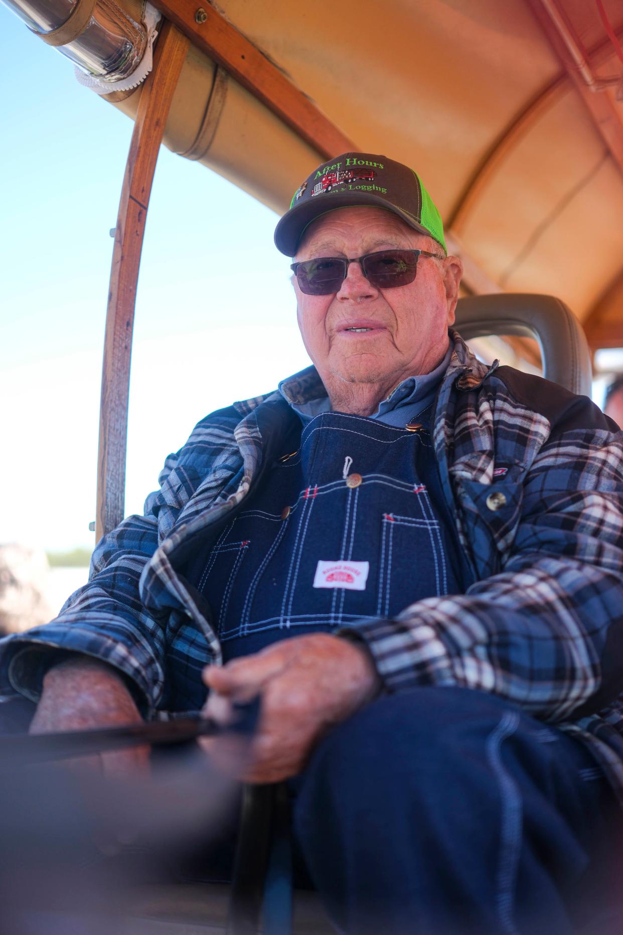 Mule Man Bernis White holds his trophy at Maury County Park during Mule Day festivities on April 6, 2024 in Columbia, Tenn.